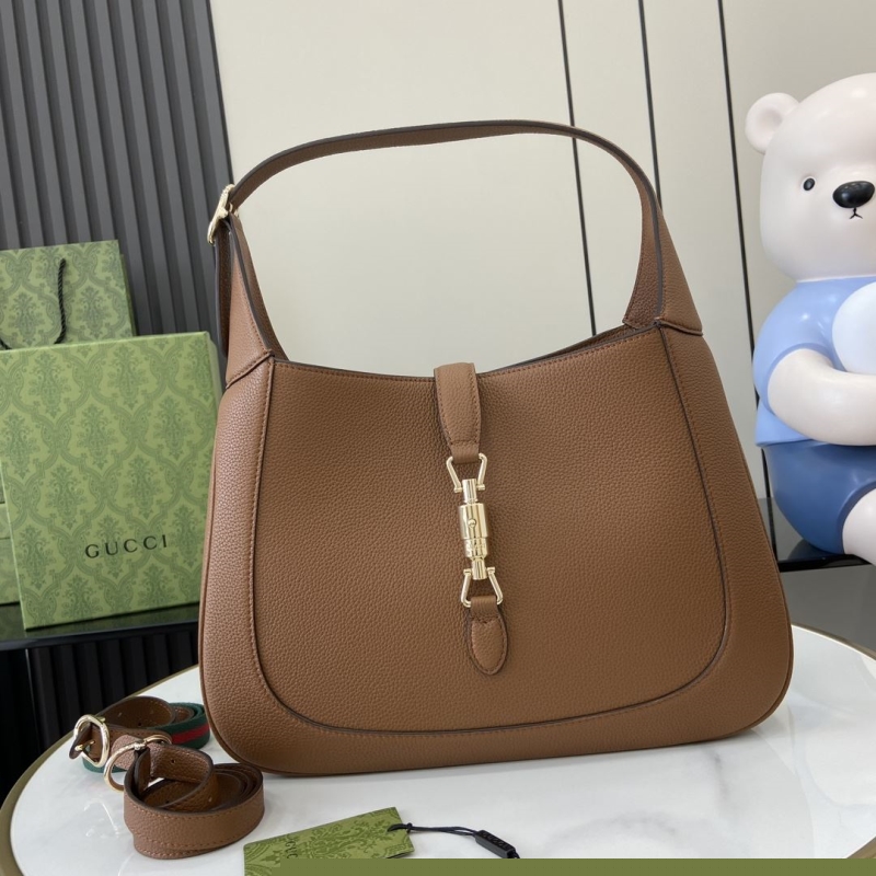 G*u*i top handle bags